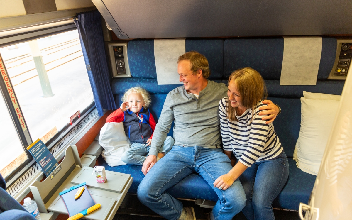 family sitting in private room onboard amtrak family sitting in private room onboard amtrak